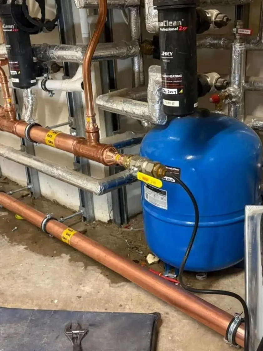 Commercial plant room with copper gas pipework, MagnaClean filters and expansion vessel